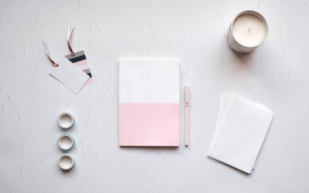 istock Top Down View of a blank note pad on a desk 1222187677