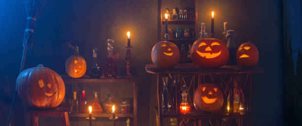 istock Halloween decoration with pumpkins and magic potions indoor 1222190531