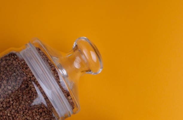 istock can of buckwheat on a yellow background 1222190607