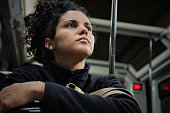 istock Pensive Hispanic young woman traveling in the subway 1222191965