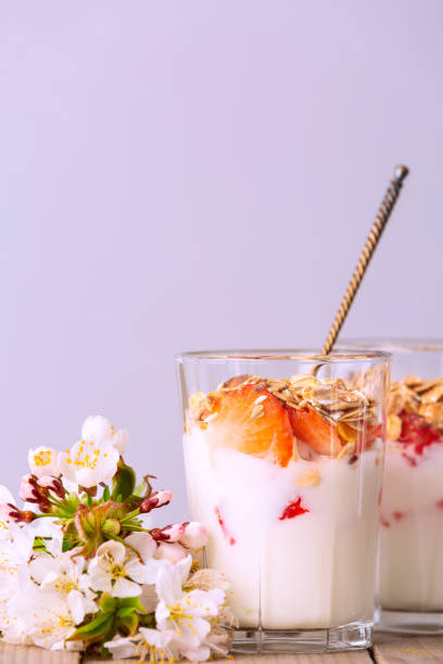 istock Muesli with yogurt and fresh berries, flowers 1222197060