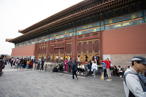Beijing,China, November 17th 2020, People queing at the entrance to one of the Palaces inside the Imperial Palace Museum, Forbidden City, Beijing