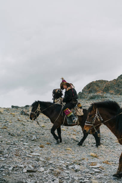 istock Eagle hunter on horse in desert in Mongolia 1222198231