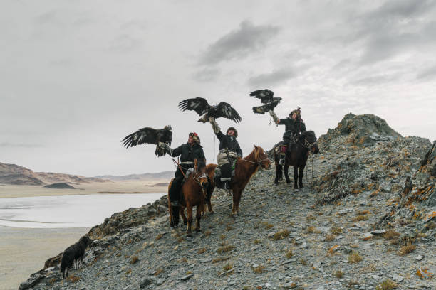 istock Eagle hunter on horse in desert in Mongolia 1222198232