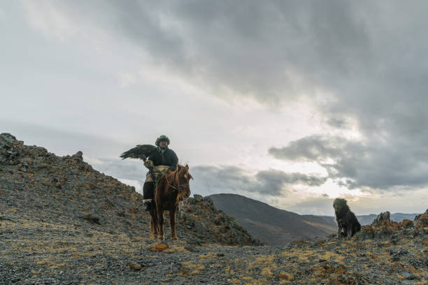 istock Eagle hunter on horse in desert in Mongolia 1222200224