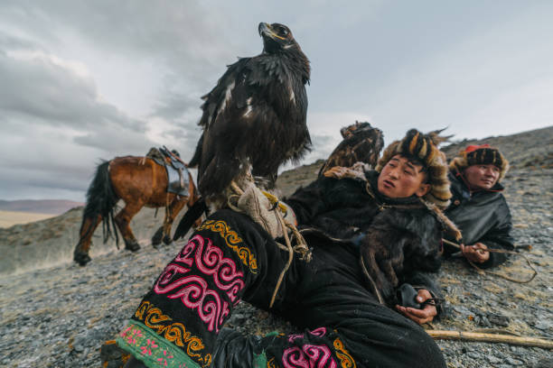 istock Eagle hunters resting in mountains in desert in Mongolia 1222201032
