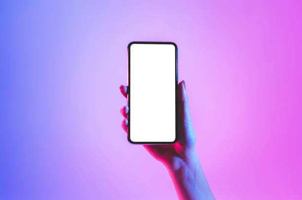 istock Blank screen smartphone in neon, close up 1222201476