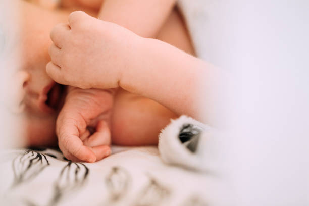 istock Cute Baby Boy Lying In The Crib 1222201565