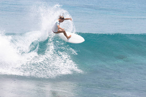 istock Surfer girl ripping 1222201828