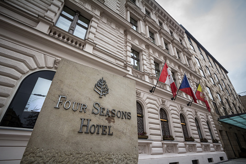 Picture of the Four Seasons sign on their hotel in Prague, Czech Republic. Four Seasons Hotels and Resorts, is a Canadian international luxury hospitality company. Four Seasons operates more than 100 hotels worldwide.