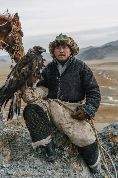 istock Eagle hunter on the background of river in Gobi desert in Mongolia 1222202010