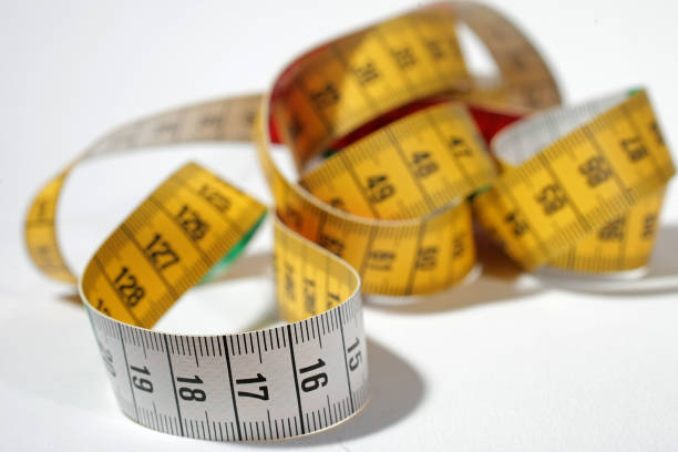 istock Colorful seamstress meter on neutral background 1222202853