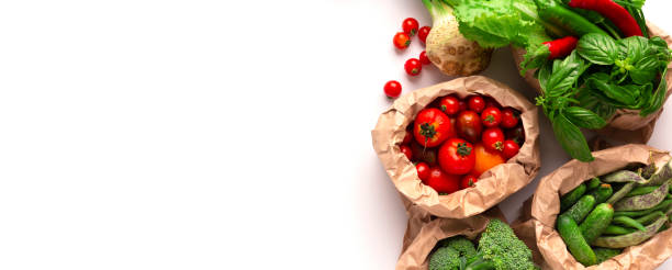 istock Organic vegetables in eco friendly packages on white 1222203218