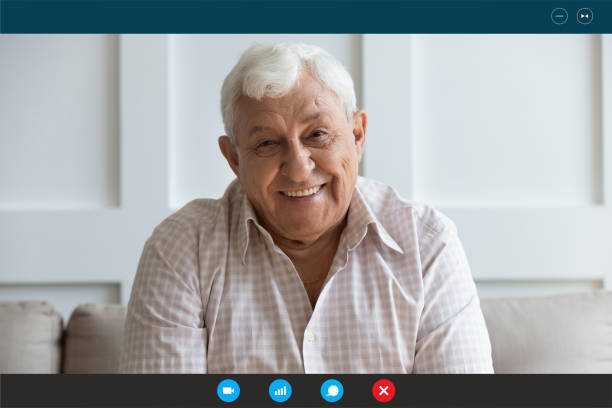 istock Screen view happy middle aged elderly man communicating online. 1222204162
