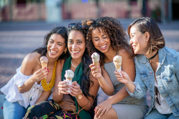 istock Group of friends eating ice cream 1222204230