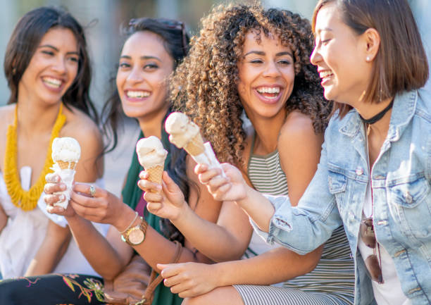 istock Group of friends eating ice cream 1222204238