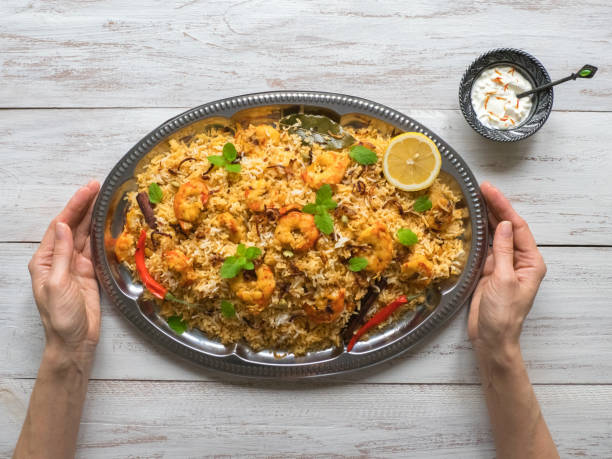 Indian Biryani with shrimp. Tasty and delicious prawns biryani, top view
