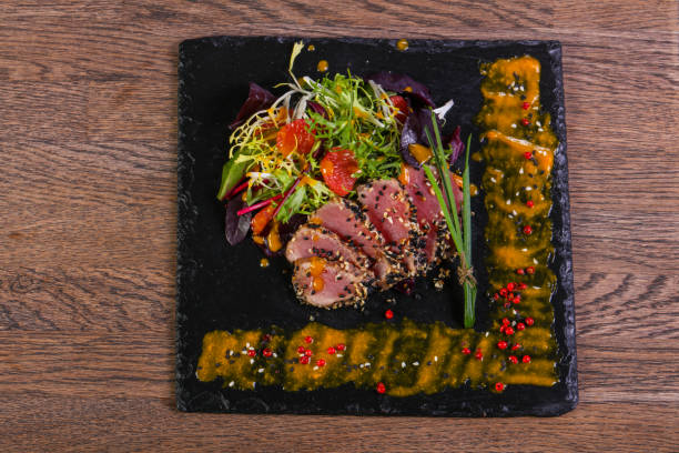 istock Tuna carpaccio with sauce 1222206004