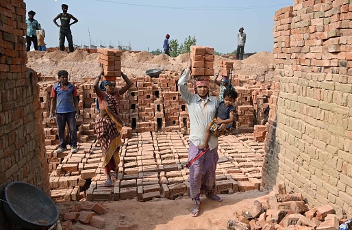 Labour working at a brick factory on the occasion of \