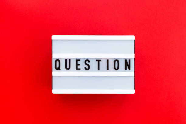 istock Message Question on white lightbox isolated on red background. Business and education concept, yes or no 1222207155