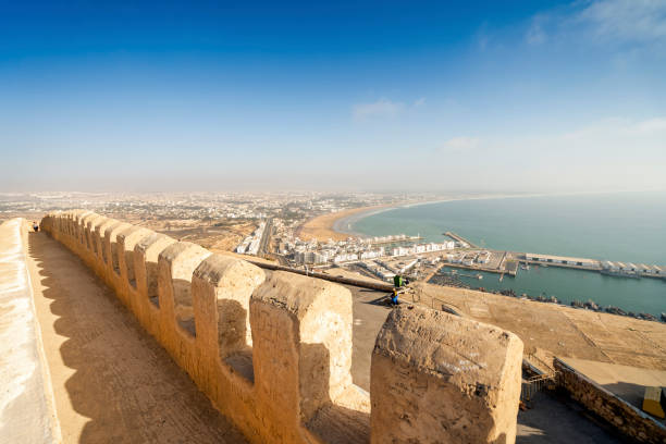 Modern Agadir with wide beach and port seen from old city walls on Oufella Hill, Morocco Modern Agadir with wide beach and port seen from old city walls on Oufella Hill, Morocco, Africa casbah stock pictures, royalty-free photos & images