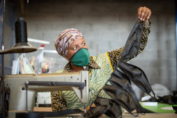 istock Seamstress checks face masks 1222207353