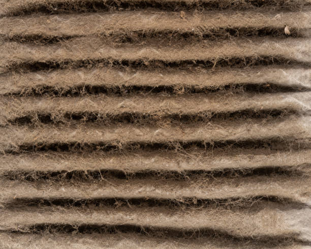 HVAC Dirty Air Filter Close up of HVAC home air filter showing the dirt and particle cause bacteria inflection and sickness. unhygienic stock pictures, royalty-free photos & images
