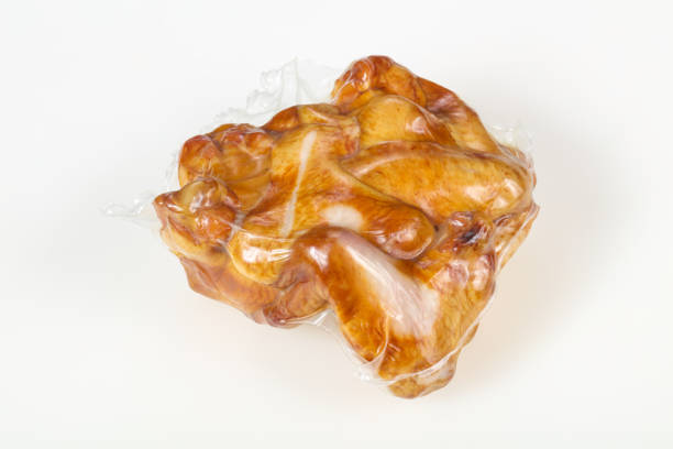 istock Smoked chicken wings over white background 1222215637