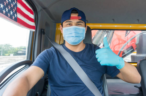 Truck driver wearing a mask