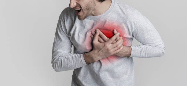 istock Man has hurt in chest, highlighted in red 1222217585