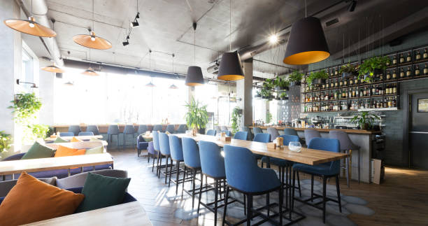 Empty bar counter interior in modern cozy cafe, panorama Empty bar counter interior in modern cozy cafe, panorama, copy space cafe interior stock pictures, royalty-free photos & images