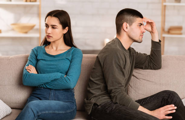 istock Couple ignoring each other after arguing during isolation 1222219804