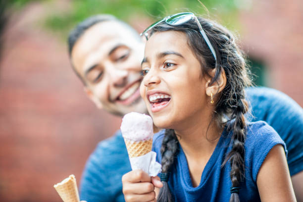 istock Family eating ice cream together 1222223397