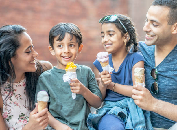 istock Family eating ice cream together 1222223411