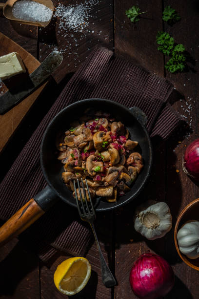 istock Mushrooms in white wine and onion sauce 1222224515