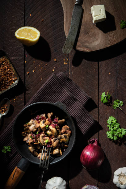 istock Mushrooms in white wine and onion sauce 1222225542