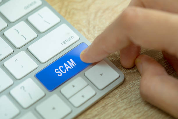 istock Close-Up Of Computer Keyboard With scam Text 1222225873