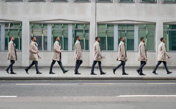 Sequence of a casual business man walking on the streets of London