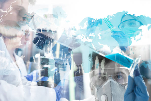 Double exposure of world map and the scientists. Concept of a pandemic virus in modern society. Development of a vaccine for treating people. Double exposure of world map and the scientists. Concept of a pandemic virus in modern society. Virus distribution, analysis, control and development of a vaccine for treating people double layer mask stock pictures, royalty-free photos & images