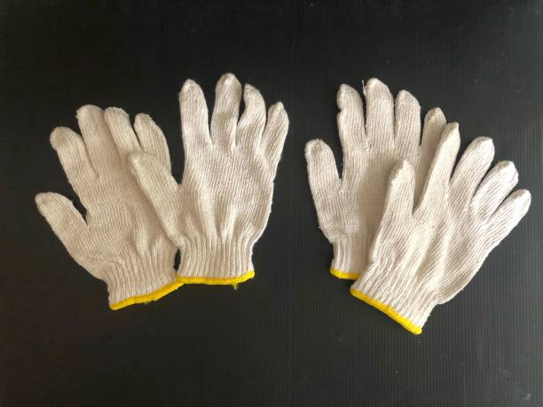 istock Cotton gloves put on background 1222234351