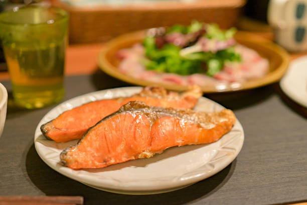 grilled salmon on the table. Dinner at home.