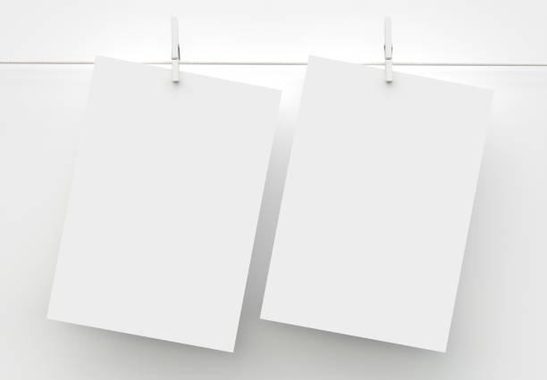 istock Two A4 Paper Sheet Mockup Hanging on Rope 1222238940