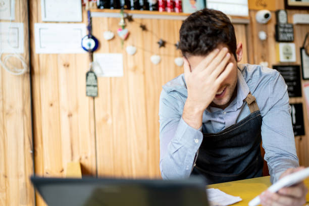 istock Worried small business owner 1222239321