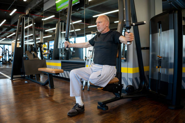 istock Disabled senior man exercising at the gym 1222240180