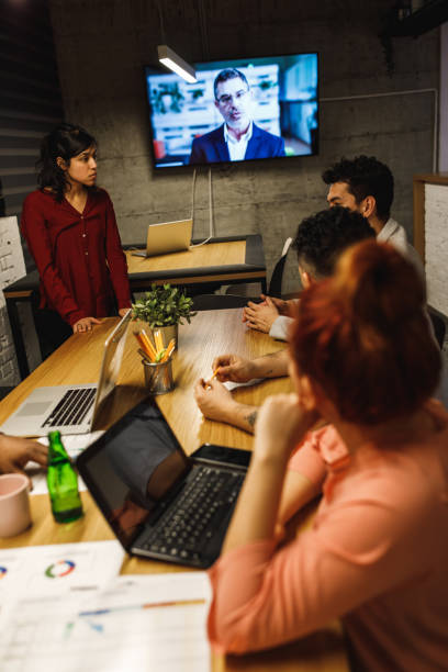 istock Late long meeting with a supervisor and team leader doing a videoconference 1222240960