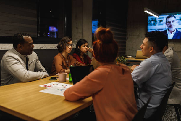 istock Multi-ethnic office remote team on the videoconference meeting with their manager 1222240996
