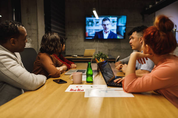 istock Remote working team listening to their manager speaking over videoconference link 1222241006