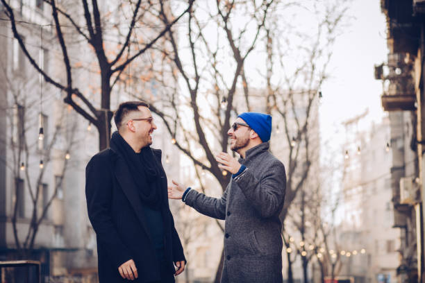 istock Two smiling men hanging out together 1222242617