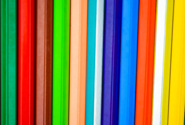 istock Different rows of different color pencil crayons placed on a white isolated background 1222242744