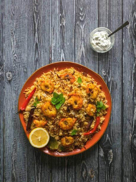 Indian Biryani with shrimp. Tasty and delicious prawns biryani, top view